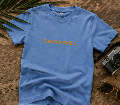 Carolina Blue SHOKOGI kids t-shirt, front flat lay with SHOKOGI chest logo